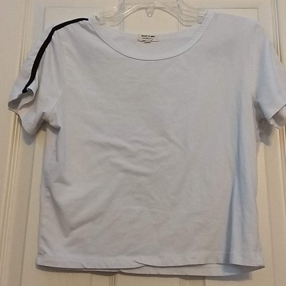 White t-shirt with black stripes on sleeves